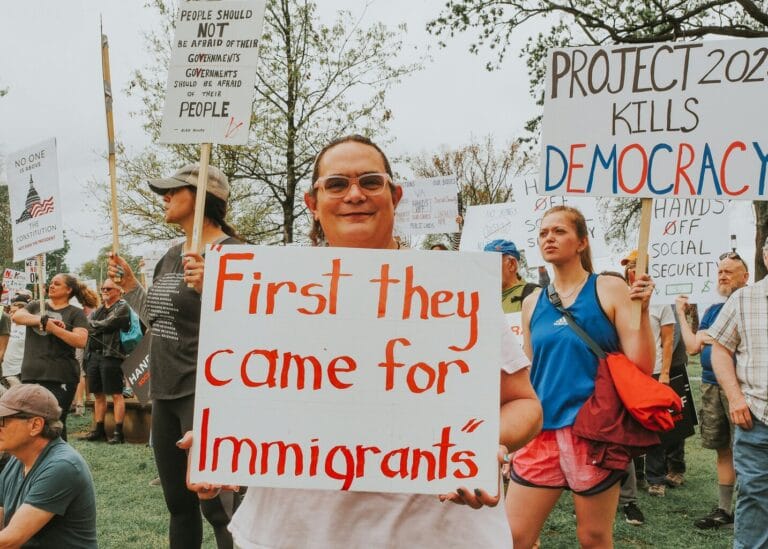 Protester holding sign