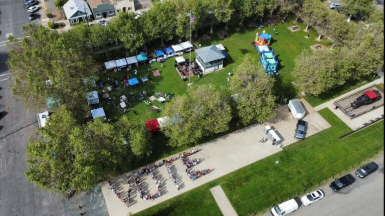 Drone shot of people spelling out VOTE