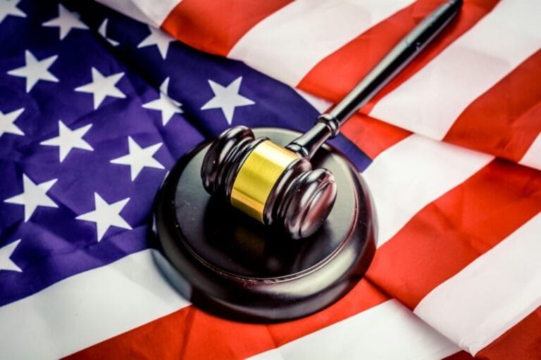 Grand jury report with flag and gavel